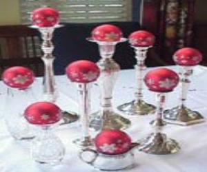 Christmas Centerpiece of Ornaments on Candlesticks